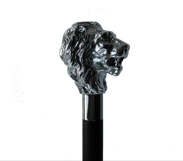 black wooden walking stick with silverplated lions head